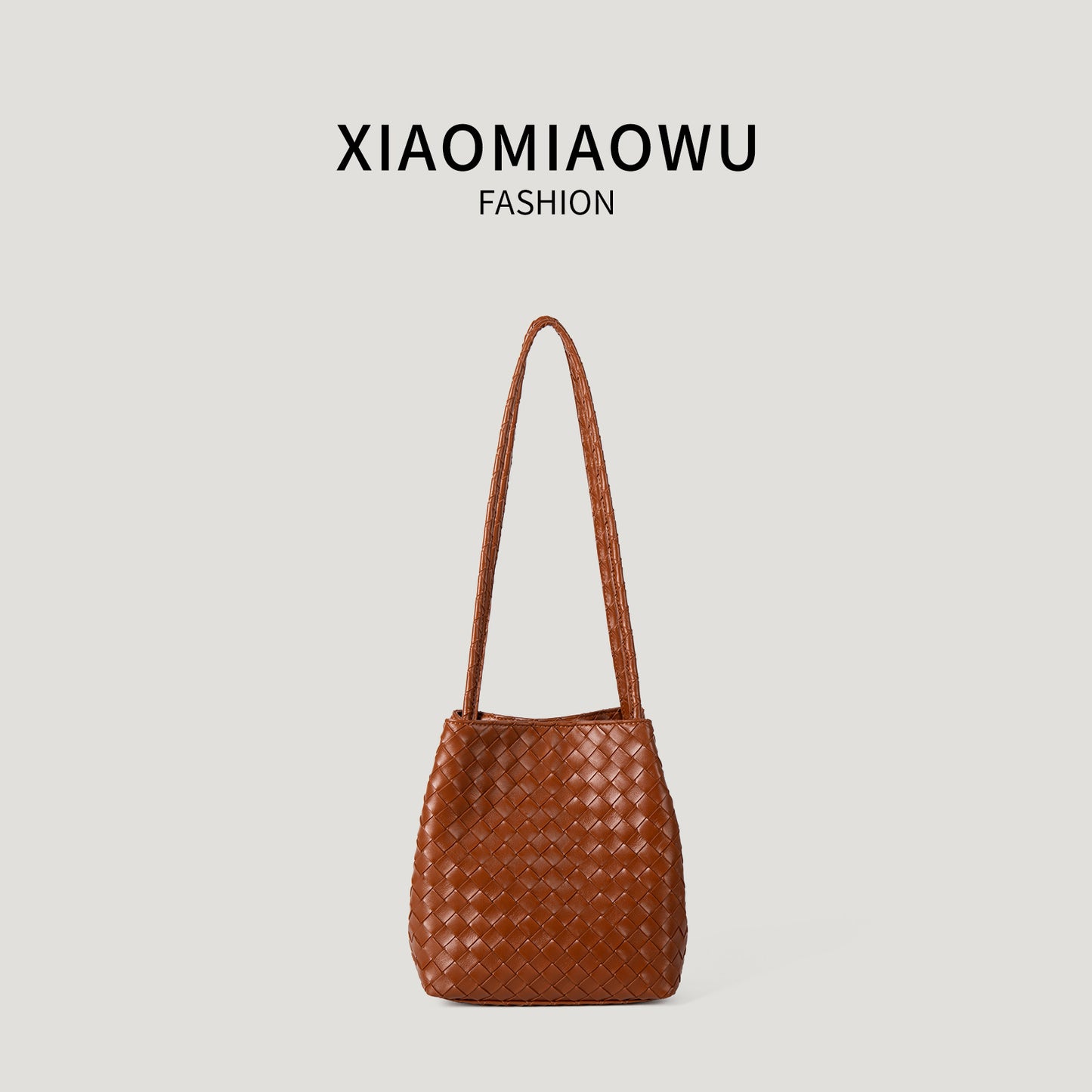 Women's High-grade Sense Woven Soft Leather Fashion Commuter Bucket Bag