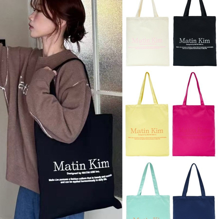 Elegant Fashion Canvas Macaron Letter Sign Women's Shoulder Bag