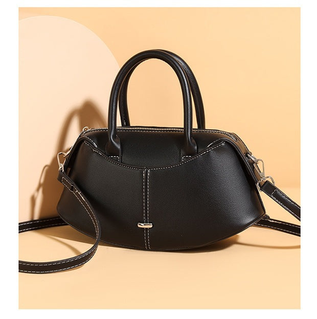 Beautiful Women's Smile French Minority Simple Handbags