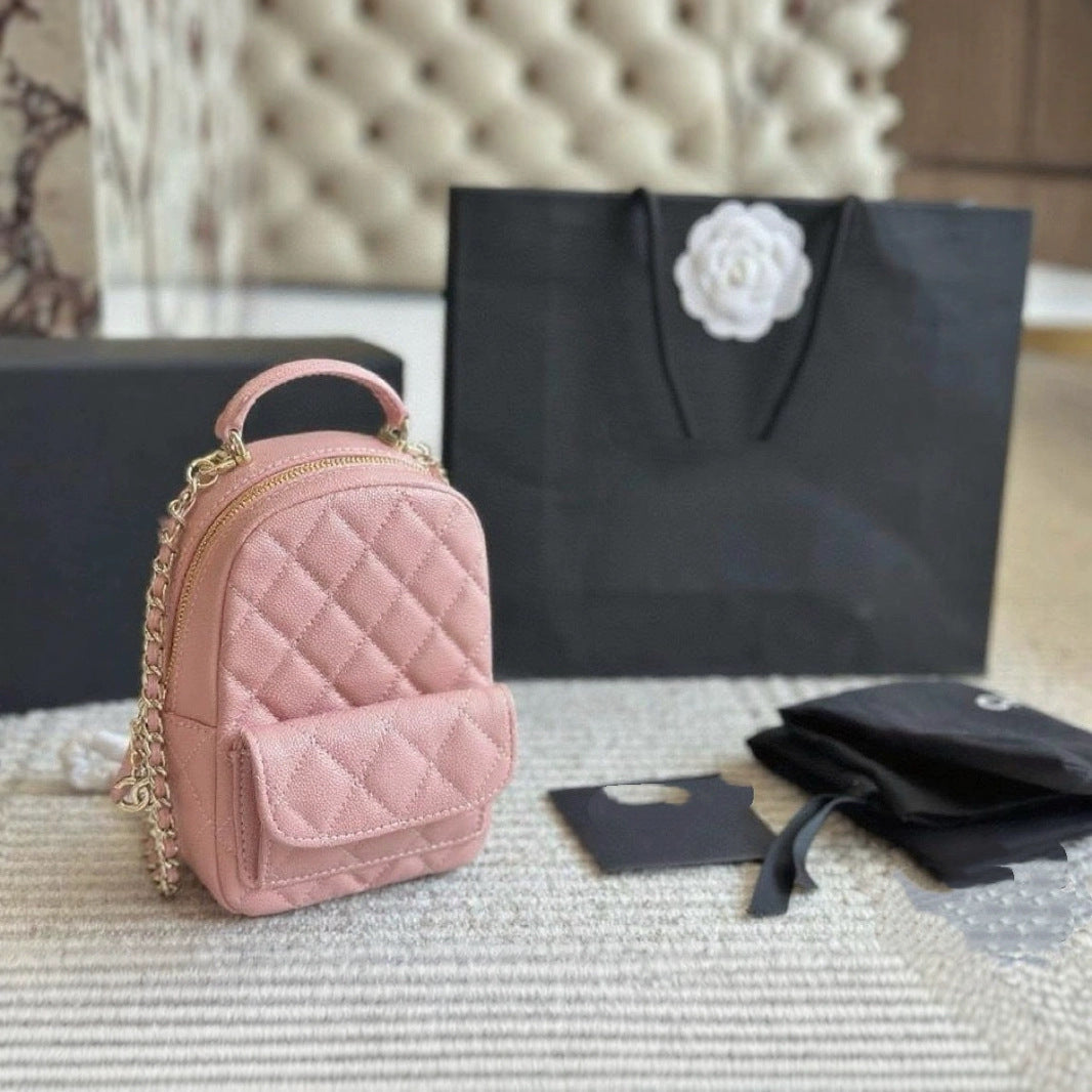 Lychee Cowhide Black Gold Chain Ball Handbags
