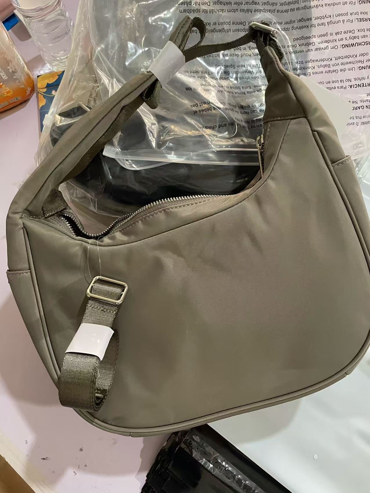 Women's & Men's Icon Croissant Commuter Dumpling Bags