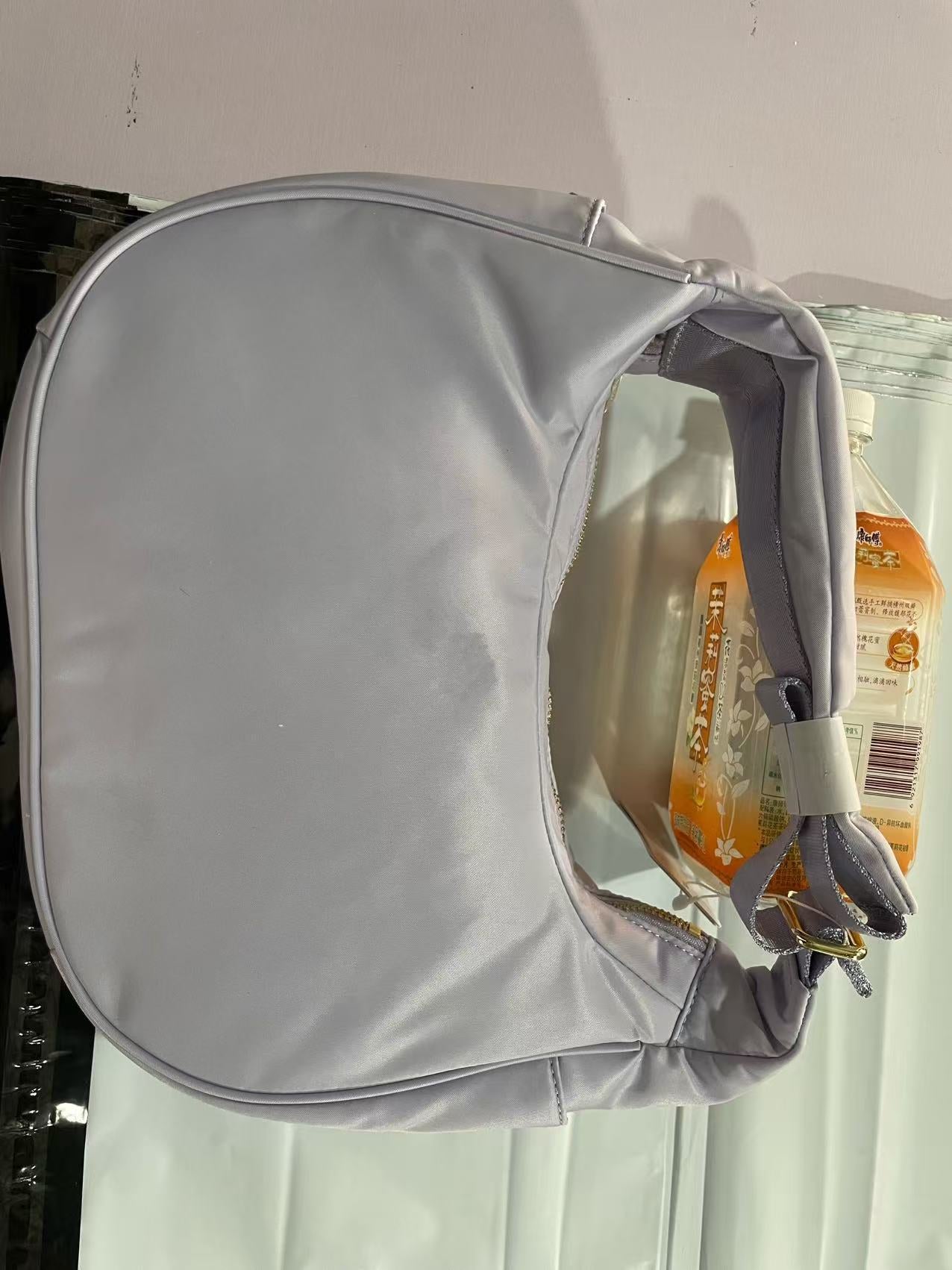 Women's & Men's Icon Croissant Commuter Dumpling Bags