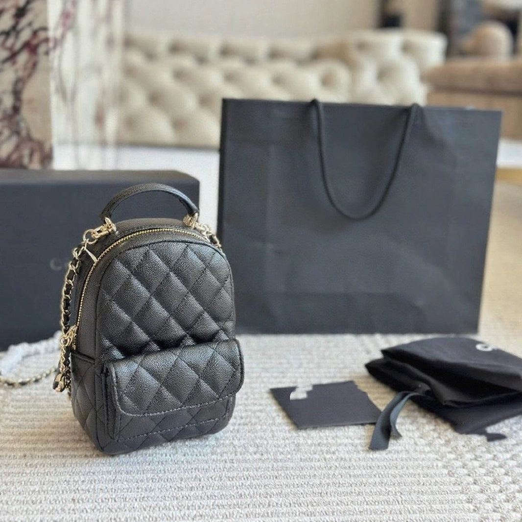 Lychee Cowhide Black Gold Chain Ball Handbags