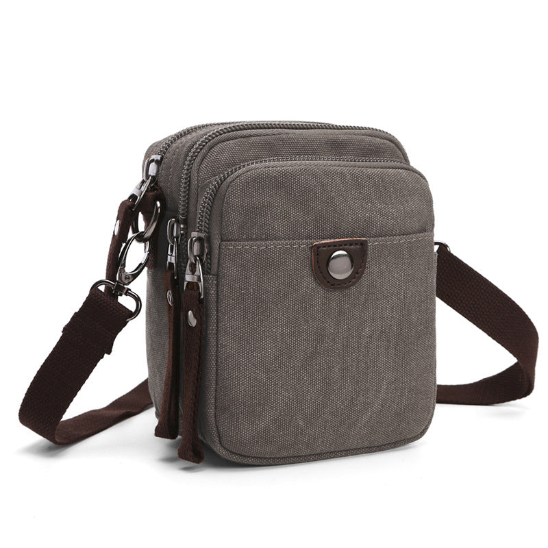 Men's Canvas Vertical Wrist Hanging Mobile Multifunctional Bags