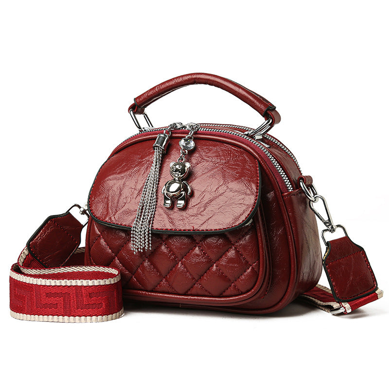 Women's Fashion Rhombus Tassel Bear Pendant Round Bags