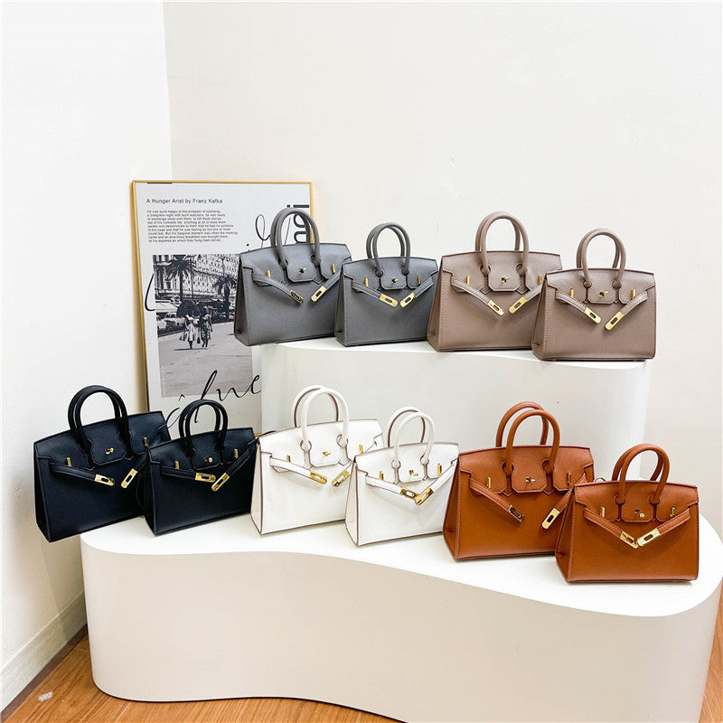 Women's Retro Classic Portable Kelly Fashion Twist Women's Handbag