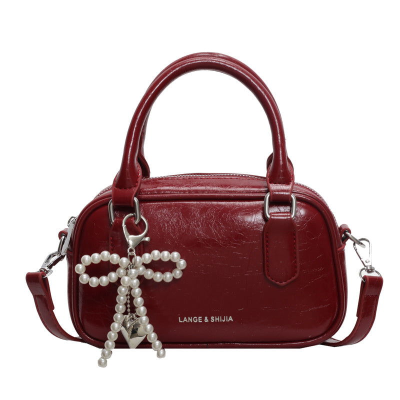 Women's Red Summer Oil Wax Leather Hand Holding Pillow Bags