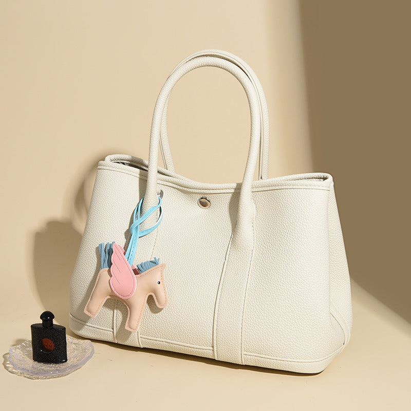 Women's Exquisite Portable Garden With Pony Pendant Large Capacity Western Women's Messenger Bag