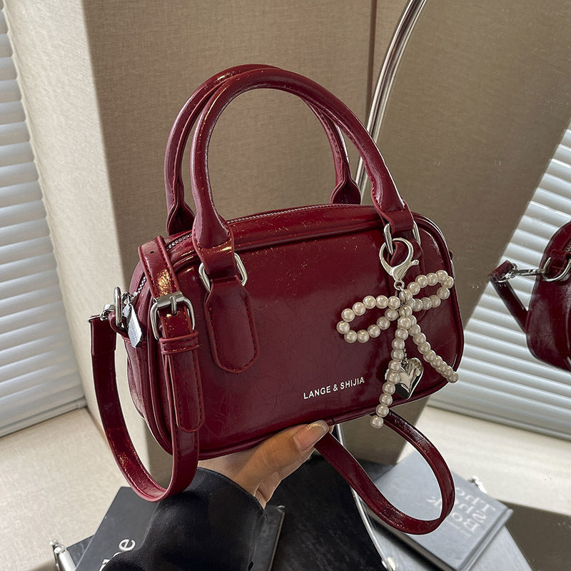 Women's Red Summer Oil Wax Leather Hand Holding Pillow Bags