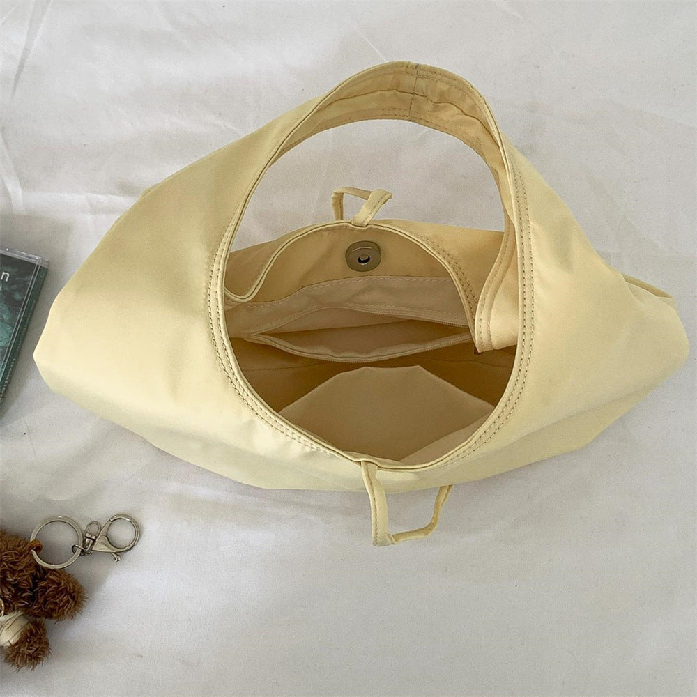 Women's Fashion Solid Color Portable Commuter Cloth Artistic Underarm Bag
