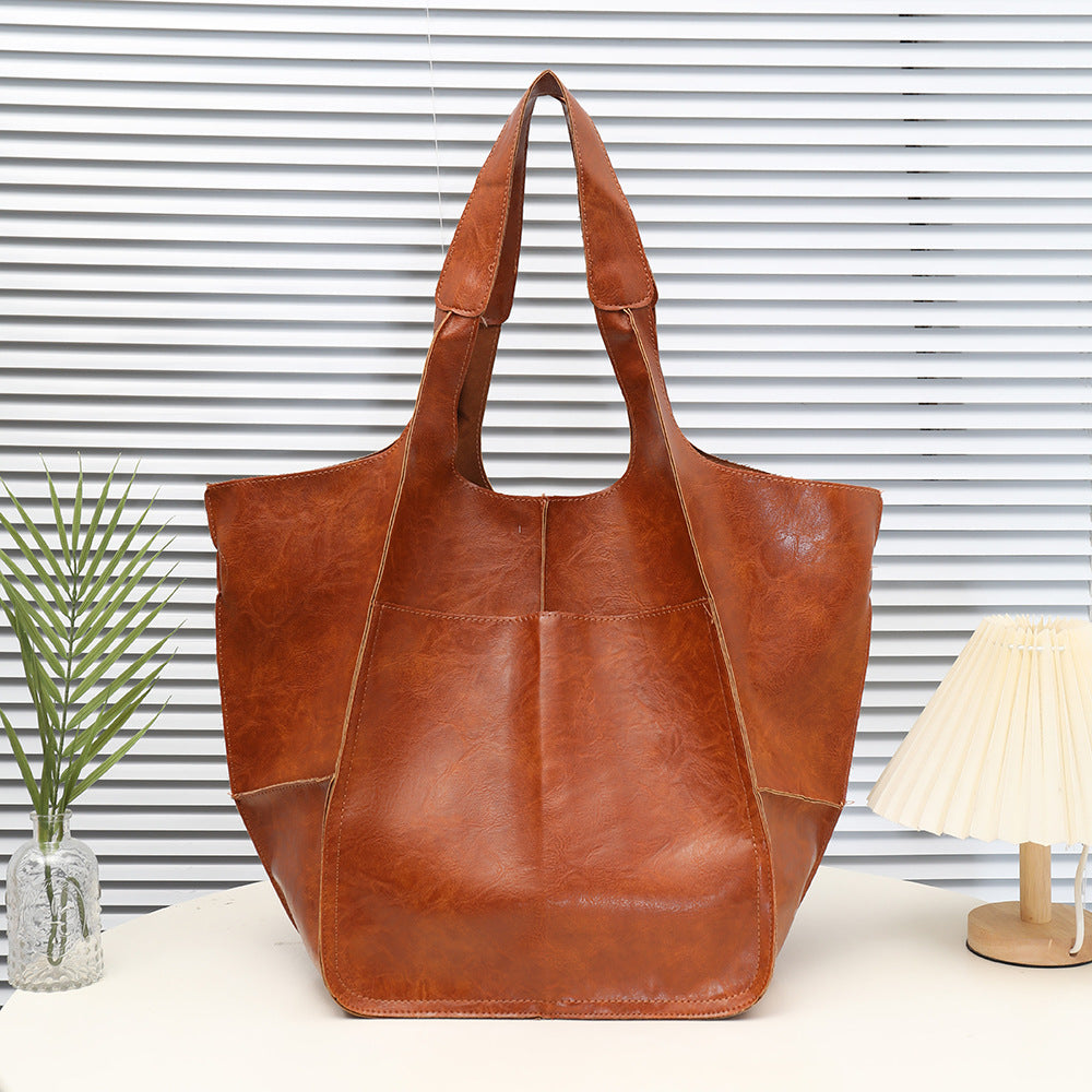 Women's Retro Soft Leather Commuter Wings Style Tote Bag