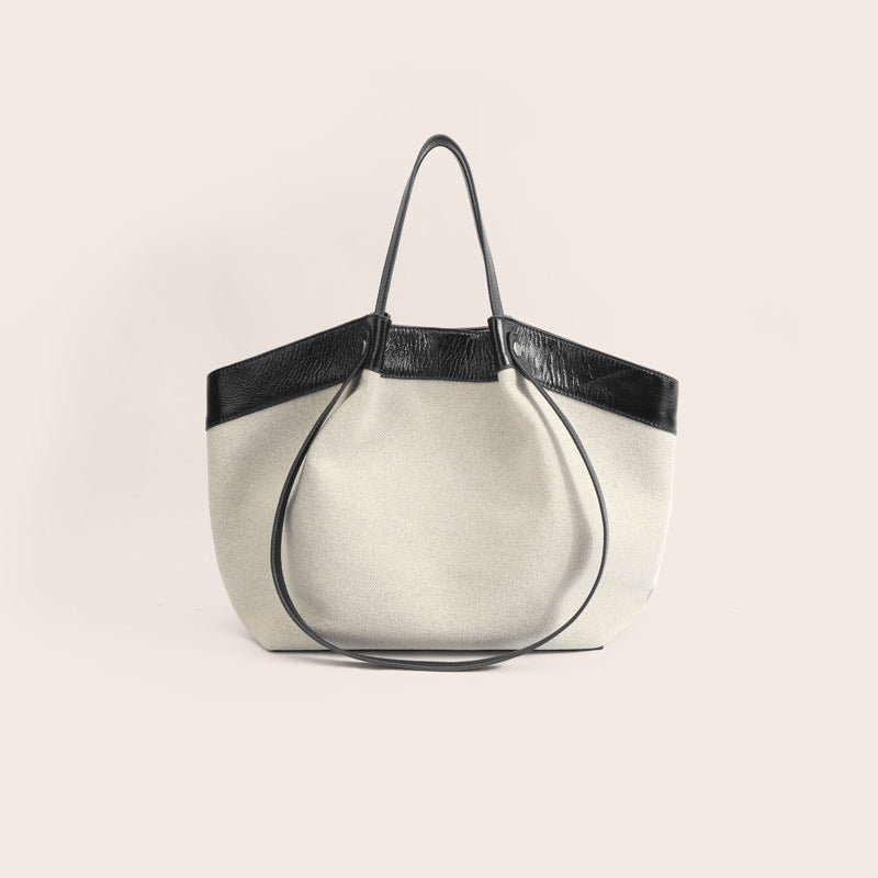 Women's Top Layer Cowhide Portable Commuter Large Capacity Bat Tote Bag