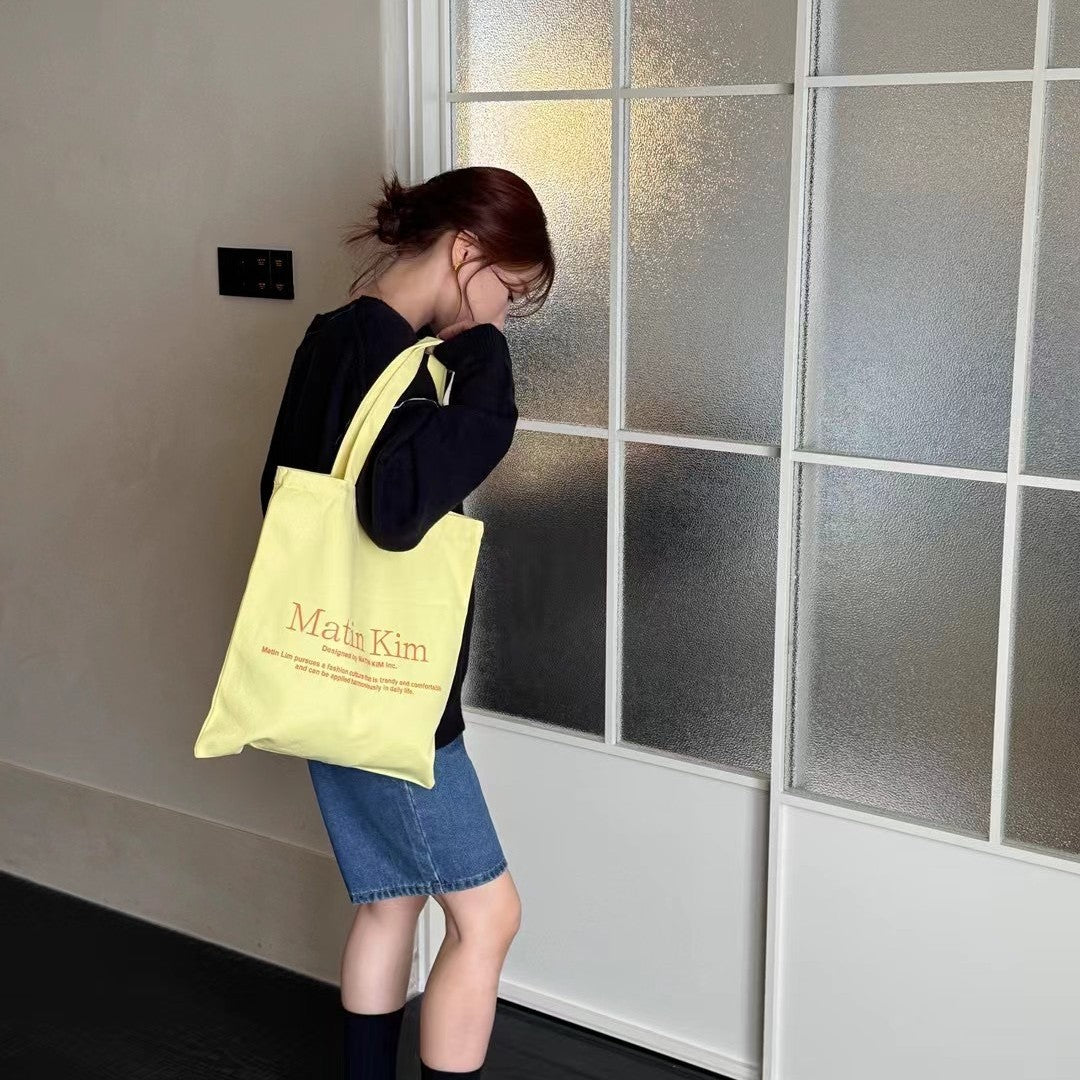 Elegant Fashion Canvas Macaron Letter Sign Women's Shoulder Bag