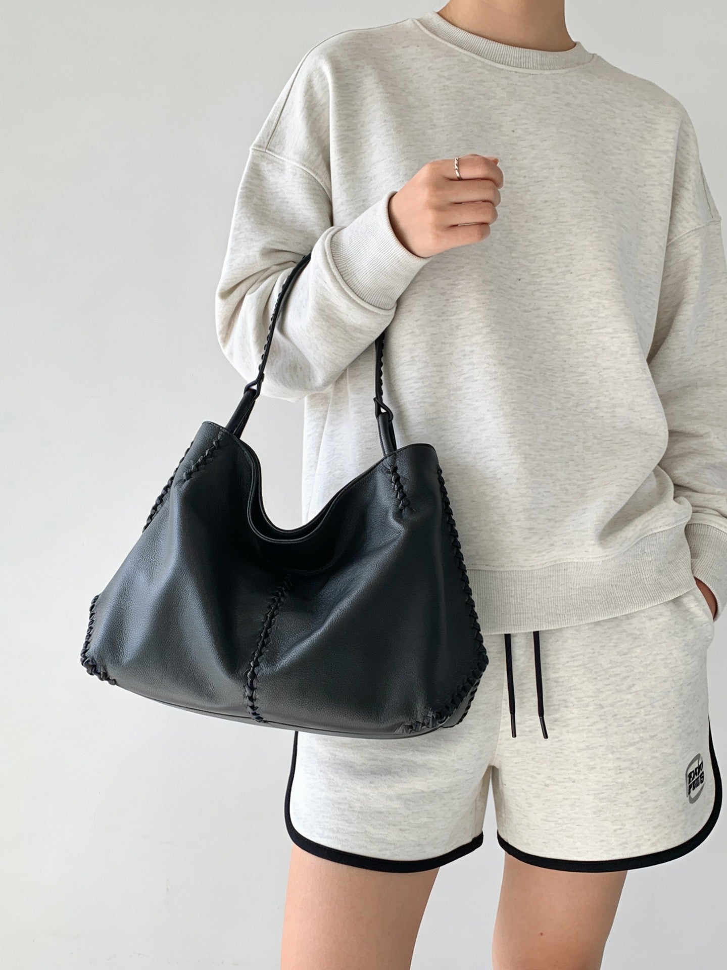 Women's Top Layer Cowhide Large Capacity Commuter Simple Woven Stitching Underarm Bag