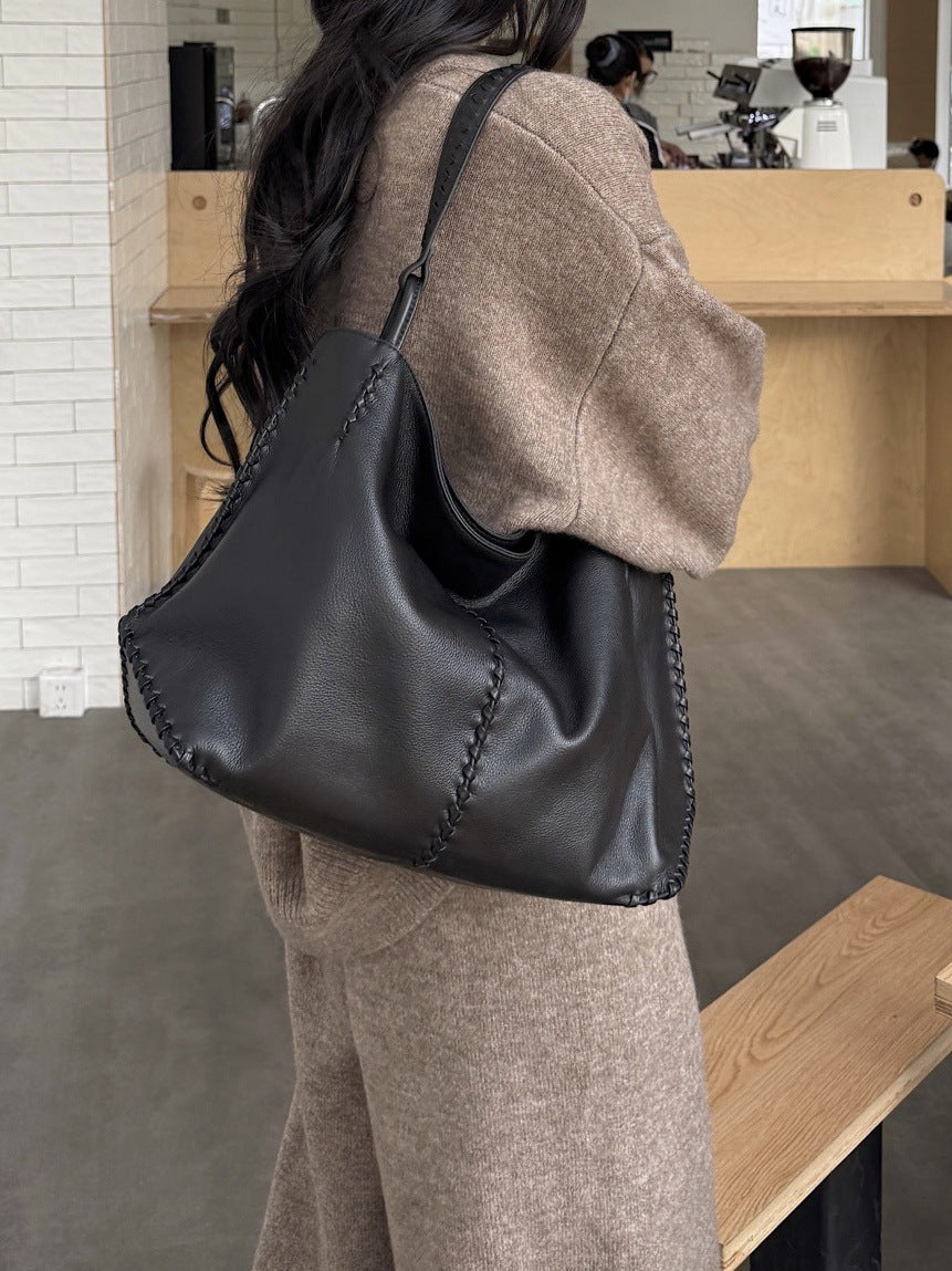 Women's Top Layer Cowhide Large Capacity Commuter Simple Woven Stitching Underarm Bag