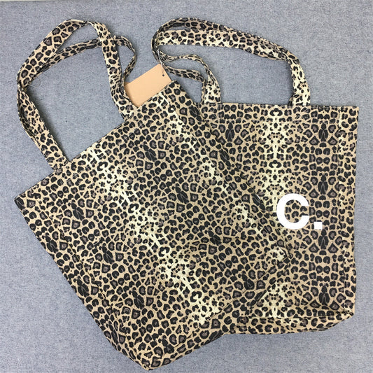 Trendy Leopard Print Vertical Canvas Shopping Women's Handbag